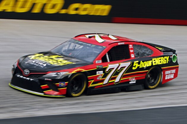 Erik Jones (77) makes his way around the track during qualifying for a NASCAR Cup Series auto race, Friday, Aug. 18, 2017, in Bristol, Tenn. Jones will start on the pole for Saturday's race. (AP Photo/Wade Payne)
