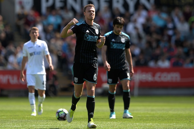 SWANSEA, WALES - MAY 21: Jonny Evans of West Bromwich Albion celebrates scoring his sides first goal during the Premier League match between Swansea City and West Bromwich Albion at Liberty Stadium on May 21, 2017 in Swansea, Wales.  (Photo by Harry Trump/Getty Images)