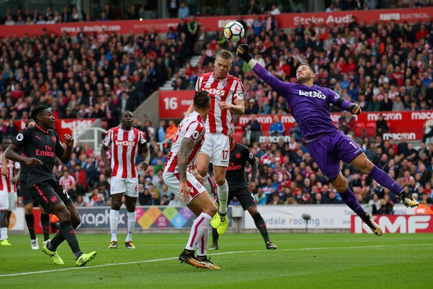 STOKE ON TRENT, ENGLAND - AUGUST 19: Jack Butland of Stoke City punches the ball out during the Premier League match between Stoke City and Arsenal at Bet365 Stadium on August 19, 2017 in Stoke on Trent, England.  (Photo by Alex Livesey/Getty Images)