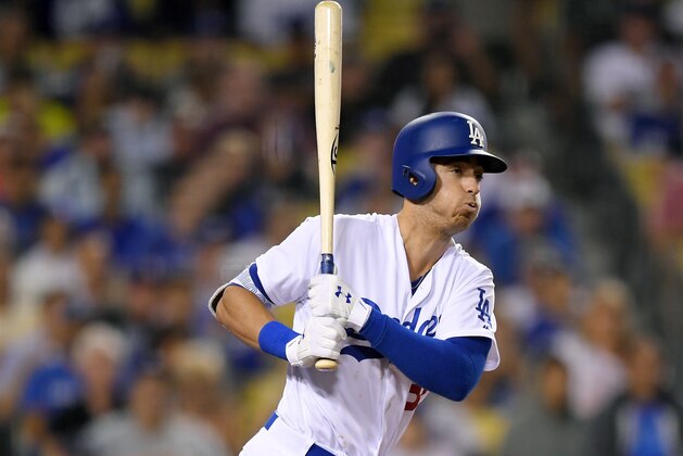 Los Angeles Dodgers' Cody Bellinger hits an RBI single during the third inning of a baseball game against the San Diego Padres, Friday, Aug. 11, 2017, in Los Angeles. (AP Photo/Mark J. Terrill) Los Angeles Dodgers' Cody Bellinger hits an RBI single during the third inning of a baseball game against the San Diego Padres, Friday, Aug. 11, 2017, in Los Angeles. (AP Photo/Mark J. Terrill)