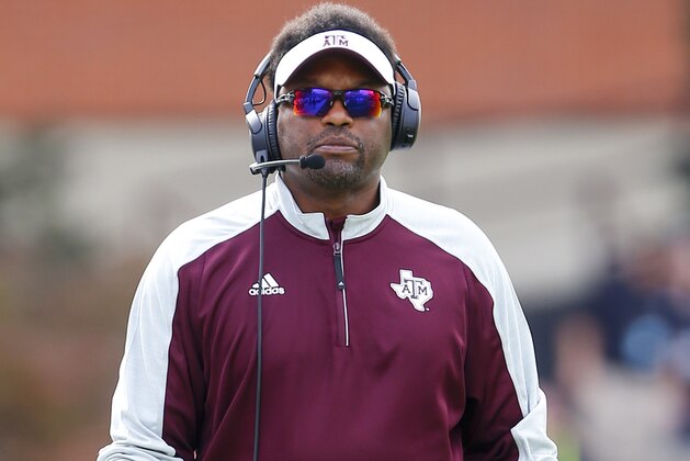 STARKVILLE, MS - NOVEMBER 5:  Head coach Kevin Sumlin of the Texas A&M Aggies walks the sideline during the first half of an NCAA college football game against the Mississippi State Bulldogs at Davis Wade Stadium on November 5, 2016 in Starkville, Mississippi. (Photo by Butch Dill/Getty Images)