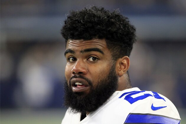Dallas Cowboys' Ezekiel Elliott stands on the sideline in the first half of a preseason NFL football game against the Indianapolis Colts on Saturday, Aug. 19, 2017, in Arlington, Texas. (AP Photo/Ron Jenkins)