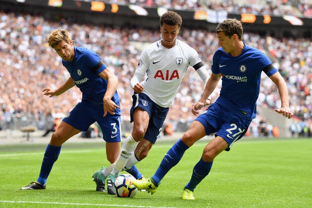 LONDON, ENGLAND - AUGUST 20:  Dele Alli of Tottenham Hotspur attempts to get past Andreas Christensen of Chelsea and Marcos Alonso of Chelsea during the Premier League match between Tottenham Hotspur and Chelsea at Wembley Stadium on August 20, 2017 in London, England.  (Photo by Justin Setterfield/Getty Images)