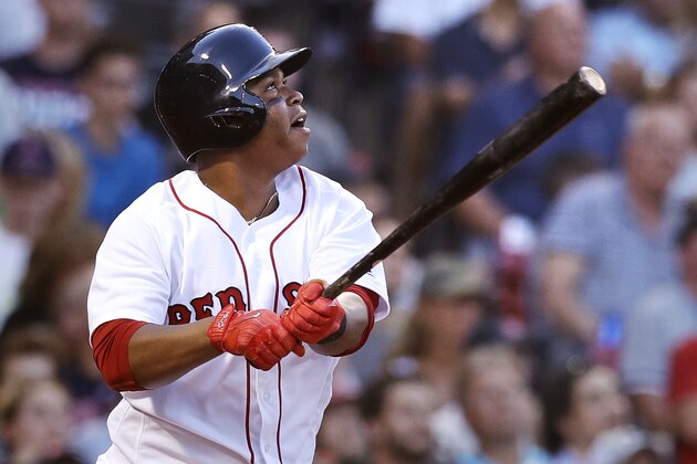Boston Red Sox's Rafael Devers watches his two-run home run off Chicago White Sox starting pitcher Miguel Gonzalez during the first inning of a baseball game at Fenway Park, Thursday, Aug. 3, 2017, in Boston. (AP Photo/Charles Krupa)