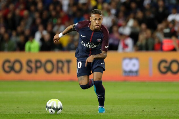 Paris Saint-Germain's Brazilian forward Neymar drives the ball during the French L1 football match Paris Saint-Germain (PSG) vs Toulouse FC (TFC) at the Parc des Princes stadium in Paris on August 20, 2017. / AFP PHOTO / Thomas SAMSON        (Photo credit should read THOMAS SAMSON/AFP/Getty Images)