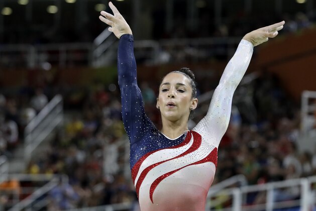 United States' Aly Raisman performs on the balance beam during the artistic gymnastics women's team final at the 2016 Summer Olympics in Rio de Janeiro, Brazil, Tuesday, Aug. 9, 2016. (AP Photo/Rebecca Blackwell)
