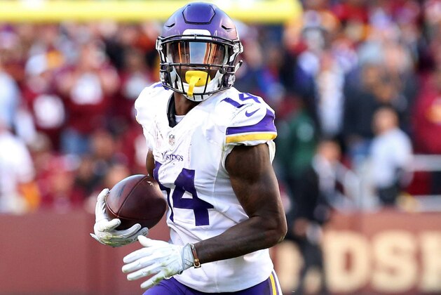 Nov 13, 2016; Landover, MD, USA; Minnesota Vikings wide receiver Stefon Diggs (14) runs with the ball against the Washington Redskins at FedEx Field. Mandatory Credit: Geoff Burke-USA TODAY Sports