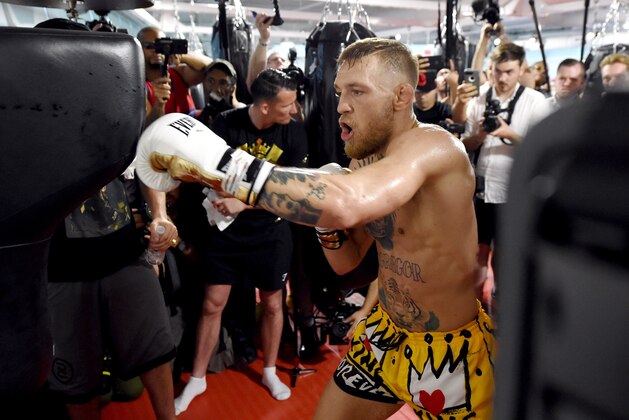 LAS VEGAS, NV - AUGUST 11:  UFC lightweight champion Conor McGregor hits an uppercut bag during a media workout at the UFC Performance Institute on August 11, 2017 in Las Vegas, Nevada. McGregor will fight Floyd Mayweather Jr. in a boxing match at T-Mobile Arena on August 26 in Las Vegas.  (Photo by Ethan Miller/Getty Images)