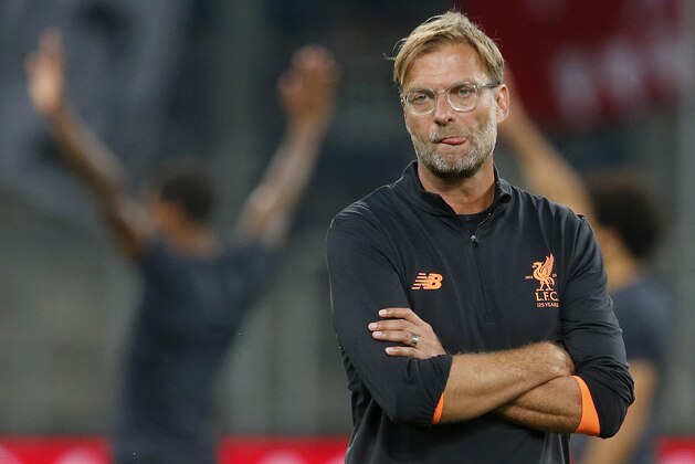 Liverpool's coach Juergen Klopp looks on prior to a Champions League's qualifier first leg soccer match between 1899 Hoffenheim and FC Liverpool, in the Rhein-Neckar-Arena, in Sinsheim, Germany, Tuesday, Aug. 15, 2017. (AP Photo/Michael Probst)