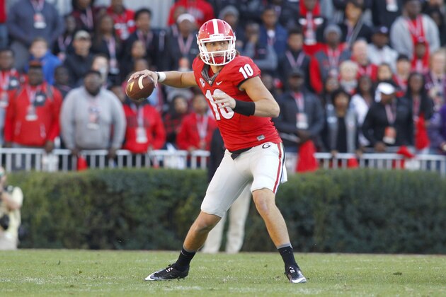 Georgia quarterback Jacob Eason (10) throws a pass against Georgia Tech in the second half of an NCAA college football game Saturday, Nov. 26, 2016, in Athens, Ga. Georgia Tech won 28-27. (AP Photo/Brett Davis)