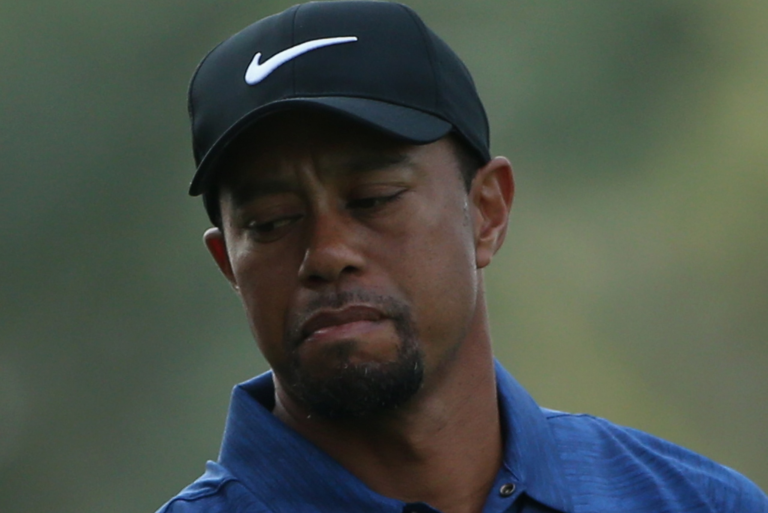 DUBAI, UNITED ARAB EMIRATES - FEBRUARY 02:  Tiger Woods of the USA reacts during the first round of the Omega Dubai Desert Classic at Emirates Golf Club on February 2, 2017 in Dubai, United Arab Emirates.  (Photo by Francois Nel/Getty Images)
