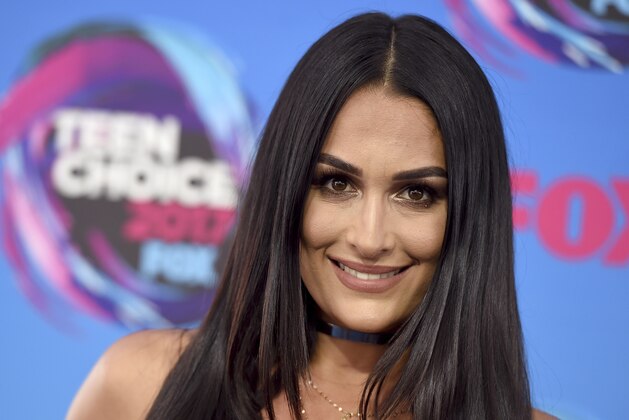 Nikki Bella arrives at the Teen Choice Awards at the Galen Center on Sunday, Aug. 13, 2017, in Los Angeles. (Photo by Jordan Strauss/Invision/AP)
