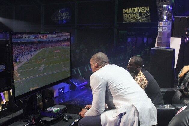 NFL players Cam Newton and LeSean McCoy compete in the