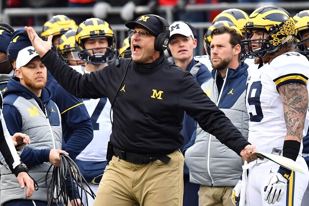 COLUMBUS, OH - NOVEMBER 26:   Head coach Jim Harbaugh of the Michigan Wolverines argues a call on the sideline during the second half against the Ohio State Buckeyes at Ohio Stadium on November 26, 2016 in Columbus, Ohio.  (Photo by Jamie Sabau/Getty Images)