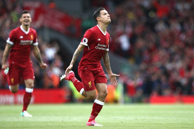 LIVERPOOL, ENGLAND - MAY 21:  Philippe Coutinho of Liverpool celebrates scoring his sides second goal during the Premier League match between Liverpool and Middlesbrough at Anfield on May 21, 2017 in Liverpool, England.  (Photo by Jan Kruger/Getty Images)