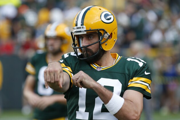 Green Bay Packers' Aaron Rodgers warms up before a preseason NFL football game against the Philadelphia Eagles Thursday, Aug. 10, 2017, in Green Bay, Wis. (AP Photo/Mike Roemer)