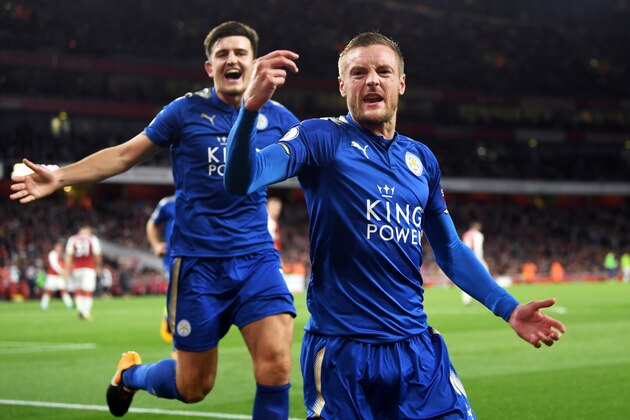 LONDON, ENGLAND - AUGUST 11:  Jamie Vardy (R) of Leicester City is congratulated by teammate Harry Maguire (L) after scoring his team's third goal during the Premier League match between Arsenal and Leicester City at the Emirates Stadium on August 11, 2017 in London, England.  (Photo by Michael Regan/Getty Images)