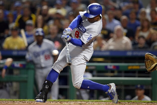 PITTSBURGH, PA - AUGUST 21:  Curtis Granderson #6 of the Los Angeles Dodgers hits a grand slam in the seventh inning against the Pittsburgh Pirates at PNC Park on August 21, 2017 in Pittsburgh, Pennsylvania.  (Photo by Justin K. Aller/Getty Images)