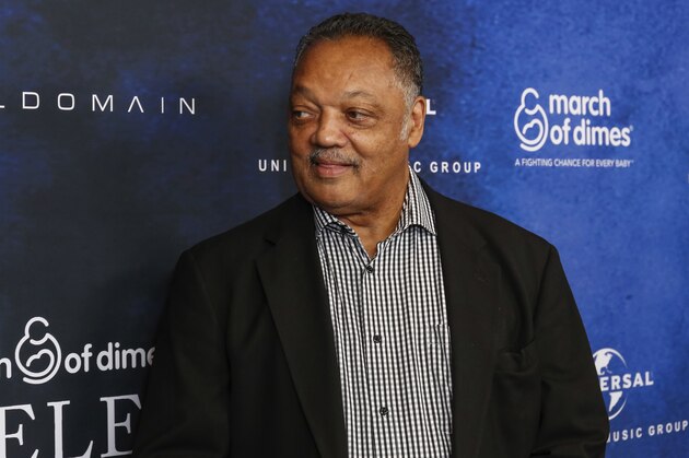 Reverend Jesse Jackson arrives at the March of Dimes