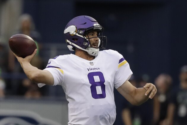 Minnesota Vikings quarterback Sam Bradford passes against the Seattle Seahawks during the first half of an NFL football preseason game, Friday, Aug. 18, 2017, in Seattle. (AP Photo/Stephen Brashear)