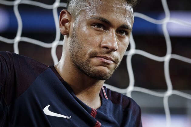 PSG's Neymar applauds with supporters after the French League One soccer match between PSG and Toulouse at the Parc des Princes stadium in Paris, France, Sunday, Aug. 20, 2017. (AP Photo/Kamil Zihnioglu)