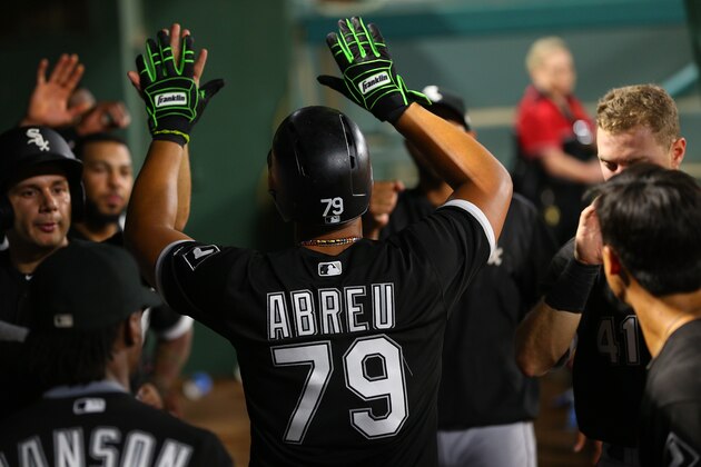 ARLINGTON, TX - AUGUST 19: Jose Abreu #79 of the Chicago White Sox congratulated for scoring in the seventh inning against the Texas Rangers at Globe Life Park in Arlington on August 19, 2017 in Arlington, Texas. (Photo by Rick Yeatts/Getty Images)