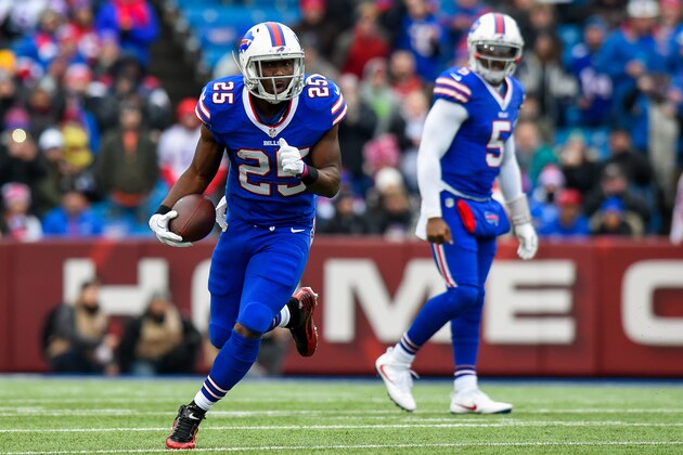 ORCHARD PARK, NY - DECEMBER 24: LeSean McCoy #25 of the Buffalo Bills runs with the ball as teammate Tyrod Taylor #5 looks on against the Miami Dolphins during the first quarter at New Era Field on December 24, 2016 in Orchard Park, New York. The Miami Dolphins defeated the Buffalo Bills 34-31 in overtime. (Photo by Rich Barnes/Getty Images) ORCHARD PARK, NY - DECEMBER 24: LeSean McCoy #25 of the Buffalo Bills runs with the ball as teammate Tyrod Taylor #5 looks on against the Miami Dolphins during the first quarter at New Era Field on December 24, 2016 in Orchard Park, New York. The Miami Dolphins defeated the Buffalo Bills 34-31 in overtime. (Photo by Rich Barnes/Getty Images)