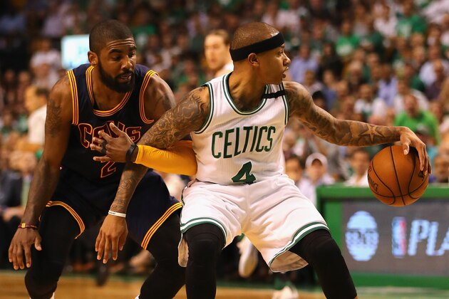 BOSTON, MA - MAY 17:  Isaiah Thomas #4 of the Boston Celtics handles the ball against Kyrie Irving #2 of the Cleveland Cavaliers in the first half during Game One of the 2017 NBA Eastern Conference Finals at TD Garden on May 17, 2017 in Boston, Massachusetts. NOTE TO USER: User expressly acknowledges and agrees that, by downloading and or using this photograph, User is consenting to the terms and conditions of the Getty Images License Agreement.  (Photo by Elsa/Getty Images)
