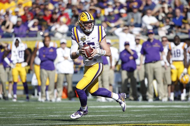 ORLANDO, FL - DECEMBER 31: Danny Etling #16 of the LSU Tigers looks to pass against the Louisville Cardinals during the Buffalo Wild Wings Citrus Bowl at Camping World Stadium on December 31, 2016 in Orlando, Florida. LSU defeated Louisville 29-9. (Photo by Joe Robbins/Getty Images)
