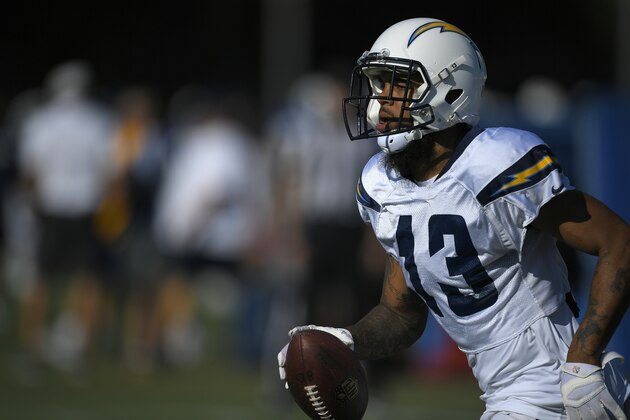 Los Angeles Chargers wide receiver Keenan Allen runs the ball during joint NFL football practice with the Los Angeles Rams, Wednesday, Aug. 9, 2017, in Irvine, Calif. (AP Photo/Mark J. Terrill)