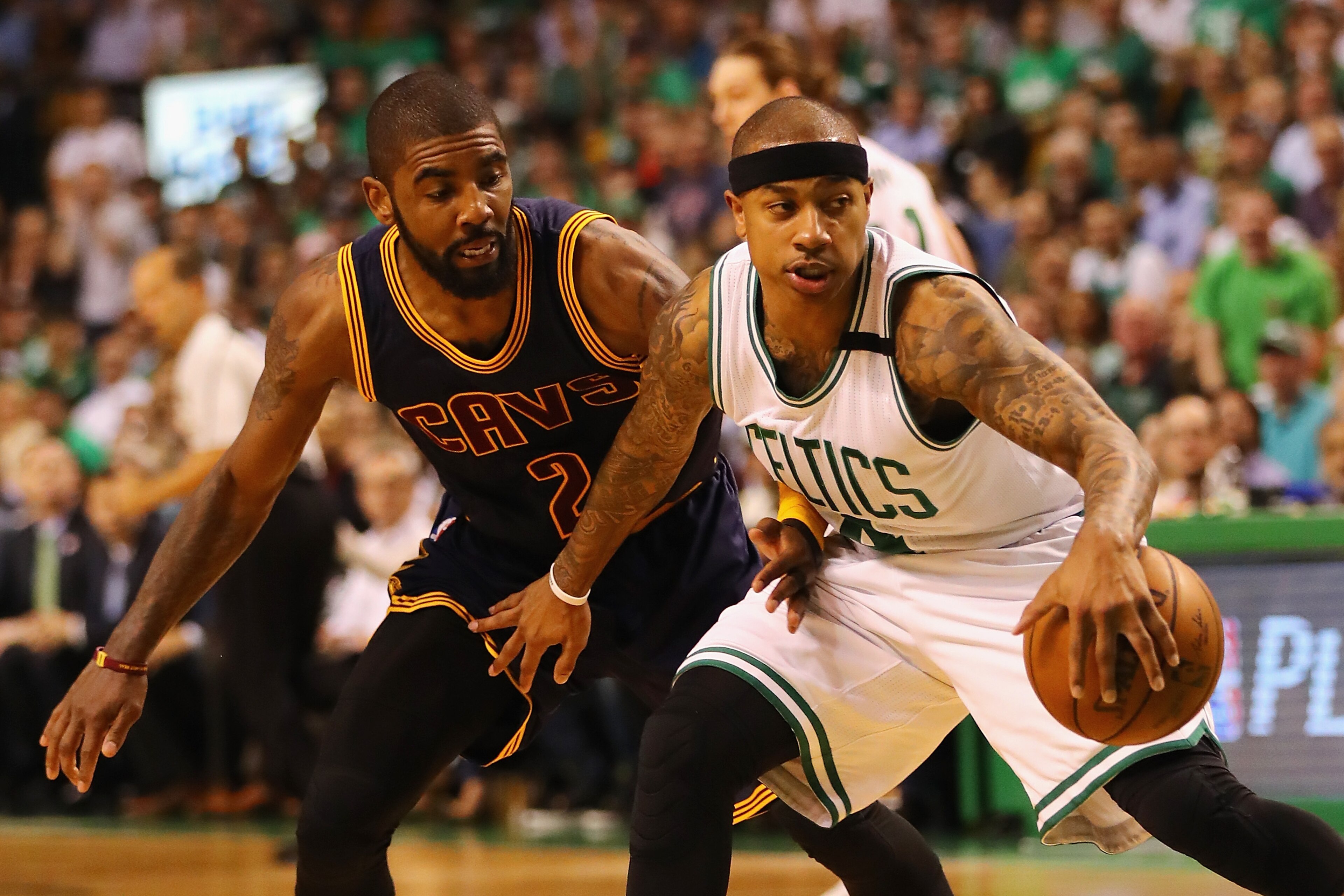 BOSTON, MA - MAY 17:  Isaiah Thomas #4 of the Boston Celtics handles the ball against Kyrie Irving #2 of the Cleveland Cavaliers in the first half during Game One of the 2017 NBA Eastern Conference Finals at TD Garden on May 17, 2017 in Boston, Massachusetts. NOTE TO USER: User expressly acknowledges and agrees that, by downloading and or using this photograph, User is consenting to the terms and conditions of the Getty Images License Agreement.  (Photo by Elsa/Getty Images)