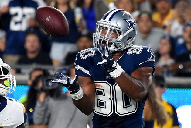 Aug 12, 2017; Los Angeles, CA, USA; Dallas Cowboys tight end Rico Gathers (80) catches a touchdown pass in front of Los Angeles Rams linebacker Folarin Orimolade (56) in the second half at the Los Angeles Memorial Coliseum. Mandatory Credit: Jayne Kamin-Oncea-USA TODAY Sports