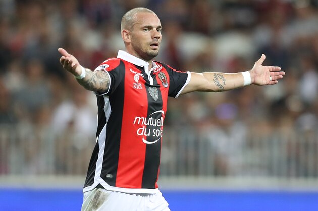 Nice's Dutch midfielder Wesley Sneijder reacts during the French L1 football match Nice vs Guingamp on August 19, 2017 at the 'Allianz Riviera' stadium in Nice, southeastern France.   / AFP PHOTO / VALERY HACHE        (Photo credit should read VALERY HACHE/AFP/Getty Images)