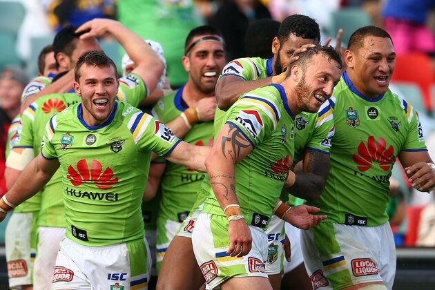 SYDNEY, AUSTRALIA - SEPTEMBER 06:  Josh Hodgson celebrates his try with team mates in golden point time during the round 26 NRL match between the Parramatta Eels and the Canberra Raiders at Pirtek Stadium on September 6, 2015 in Sydney, Australia.  (Photo by Renee McKay/Getty Images)