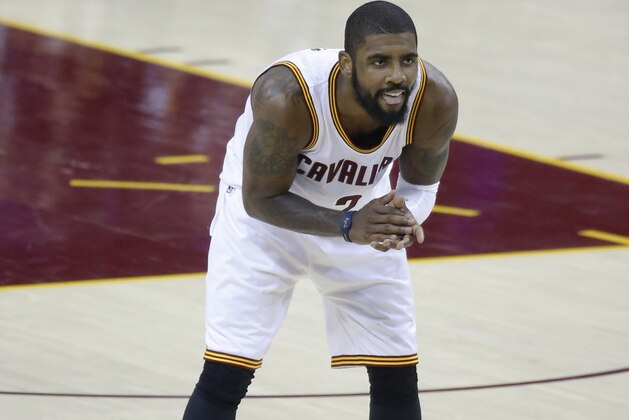 Cleveland Cavaliers guard Kyrie Irving reacts during play against the Golden State Warriors during the first half of Game 4 of basketball's NBA Finals in Cleveland, Friday, June 9, 2017. (AP Photo/Ron Schwane)