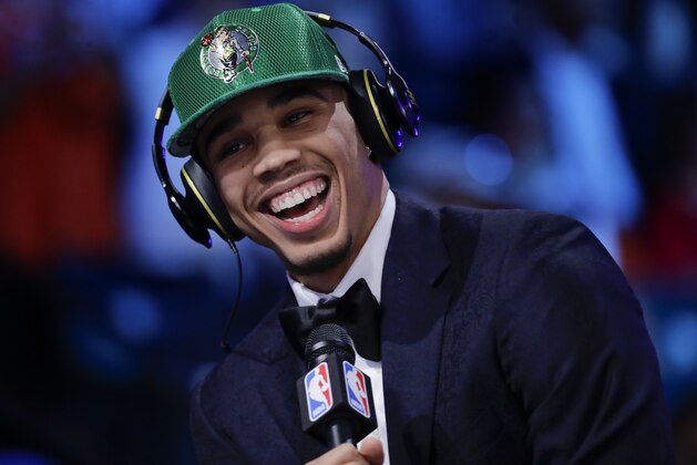 Duke's Jayson Tatum answers questions during an interview after being selected by the Boston Celtics as the third pick overall during the NBA basketball draft, Thursday, June 22, 2017, in New York. (AP Photo/Frank Franklin II)