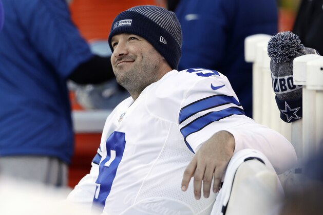 FILE - In this Jan. 1, 2017, file photo, Dallas Cowboys' Tony Romo smiles on the bench during the second half of an NFL football game against the Philadelphia Eagles in Philadelphia. A person with knowledge of the decision says Romo is retiring rather than trying to chase a Super Bowl with another team after losing his starting job with the Dallas Cowboys. The all-time passing leader for the storied franchise is headed to the broadcast booth after considering those offers. The person spoke to The Associated Press on condition of anonymity Tuesday, April 4, 2017, because Romo's decision hasn't been announced.  (AP Photo/Matt Rourke, File)