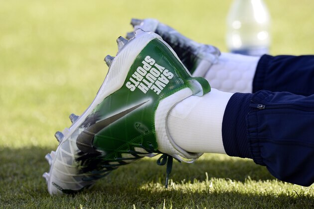 Tennessee Titans running back Derrick Henry wears special cleats as part of the NFL's