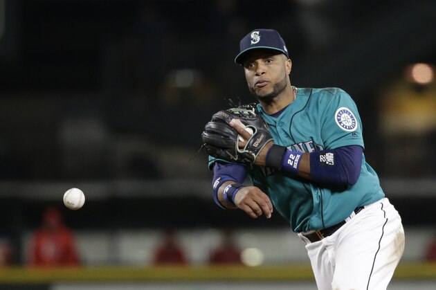 Seattle Mariners second baseman Robinson Cano in action against the Los Angeles Angels in a baseball game Friday, Aug. 11, 2017, in Seattle. (AP Photo/Elaine Thompson)