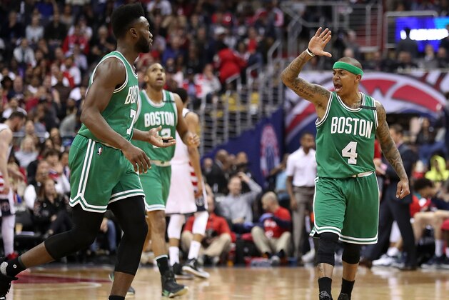 WASHINGTON, DC - MAY 12:  Isaiah Thomas #4 of the Boston Celtics reacts to Jaylen Brown #7 after a score against the Washington Wizards during Game Six of the NBA Eastern Conference Semi-Finals at Verizon Center on May 12, 2017 in Washington, DC.  NOTE TO USER: User expressly acknowledges and agrees that, by downloading and or using this photograph, User is consenting to the terms and conditions of the Getty Images License Agreement.  (Photo by Rob Carr/Getty Images)