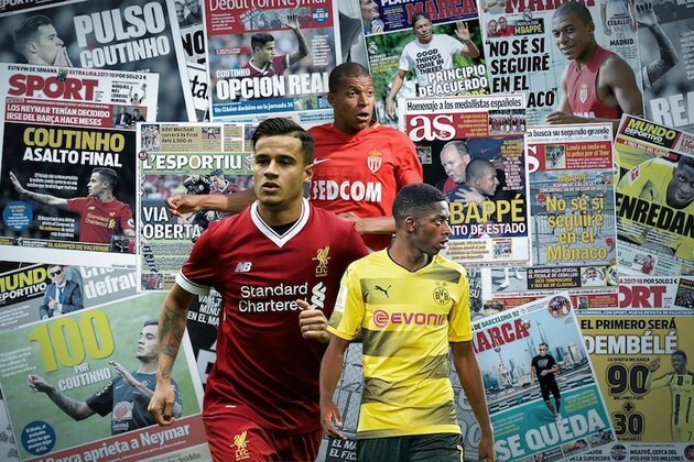 Real Madrid's French new player Theo Hernandez (L) poses with his new shirt next to Real Madrid President Florentino Perez during his presentation at the Santiago Bernabeu stadium in Madrid, on July 10, 2017. / AFP PHOTO / JAVIER SORIANO        (Photo credit should read JAVIER SORIANO/AFP/Getty Images)