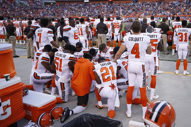 CLEVELAND, OH - AUGUST 21: A group of Cleveland Browns players kneel in a circle in protest during the national anthem prior to a preseason game against the New York Giants at FirstEnergy Stadium on August 21, 2017 in Cleveland, Ohio. (Photo by Joe Robbins/Getty Images)