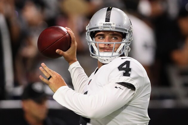 GLENDALE, AZ - AUGUST 12:  Quarterback Derek Carr #4 of the Oakland Raiders warms up before the NFL game against the Arizona Cardinals at the University of Phoenix Stadium on August 12, 2017 in Glendale, Arizona. The Cardinals defeated the Raiders 20-10.  (Photo by Christian Petersen/Getty Images)
