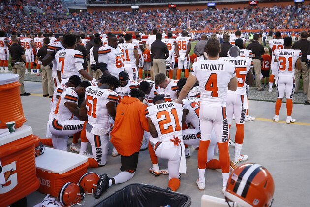 CLEVELAND, OH - AUGUST 21: A group of Cleveland Browns players kneel in a circle in protest during the national anthem prior to a preseason game against the New York Giants at FirstEnergy Stadium on August 21, 2017 in Cleveland, Ohio. (Photo by Joe Robbins/Getty Images)
