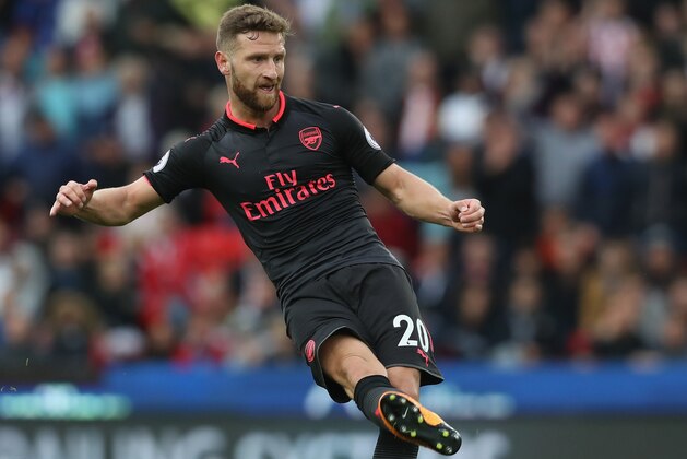STOKE ON TRENT, ENGLAND - AUGUST 19:  Shkodran Mustafi of Arsenal passes the ball during the Premier League match between Stoke City and Arsenal at Bet365 Stadium on August 19, 2017 in Stoke on Trent, England.  (Photo by David Rogers/Getty Images)