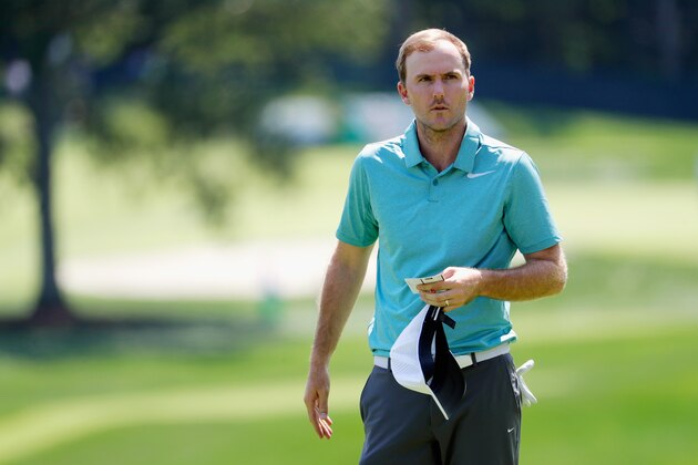 WESTBURY, NY - AUGUST 24:  Russell Henley of the United States stands on the 18th green during round one of The Northern Trust at Glen Oaks Club on August 24, 2017 in Westbury, New York.  (Photo by Jamie Squire/Getty Images)