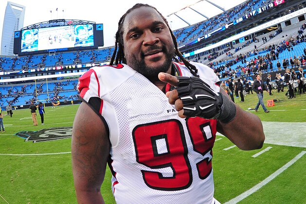 CHARLOTTE, NC - NOVEMBER 16: Tyson Jackson #99 of the Atlanta Falcons celebrates after the game against the Carolina Panthers at Bank Of America Stadium on November 16, 2014 in Charlotte, North Carolina. (Photo by Scott Cunningham/Getty Images)