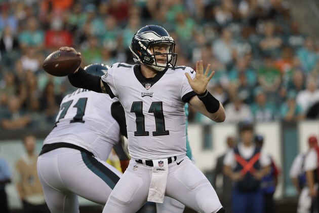 Philadelphia Eagles' Carson Wentz in action during the first half of a preseason NFL football game against the Miami Dolphins, Thursday, Aug. 24, 2017, in Philadelphia. (AP Photo/Michael Perez)