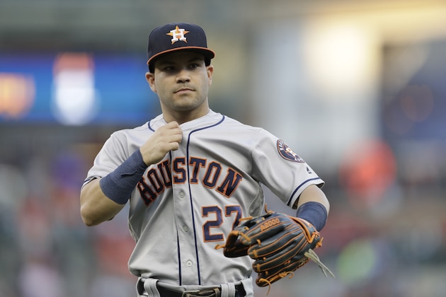 Houston Astros second baseman Jose Altuve walks back to the dugout during the fourth inning of a baseball game against the Detroit Tigers, Friday, July 28, 2017, in Detroit. (AP Photo/Carlos Osorio)