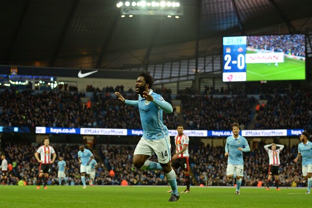 Manchester City's Ivorian striker Wilfried Bony celebrates scoring their third goal during the English Premier League football match between Manchester City and Sunderland at The Etihad stadium in Manchester, north west England on December 26, 2015. AFP PHOTO / OLI SCARFF

RESTRICTED TO EDITORIAL USE. No use with unauthorized audio, video, data, fixture lists, club/league logos or 'live' services. Online in-match use limited to 75 images, no video emulation. No use in betting, games or single club/league/player publications. / AFP / OLI SCARFF        (Photo credit should read OLI SCARFF/AFP/Getty Images)